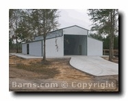 metal barn with concrete